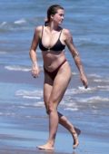 Ireland Baldwin seen wearing a bikini while enjoying a day with friends at the beach in Malibu, California