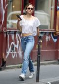 Lily-Rose Depp wears a white crop top and jeans as she steps out in Paris, France