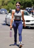 Lucy Hale shows off her toned body in a crop top and leggings as she goes for a hike with a friend in Los Feliz, California