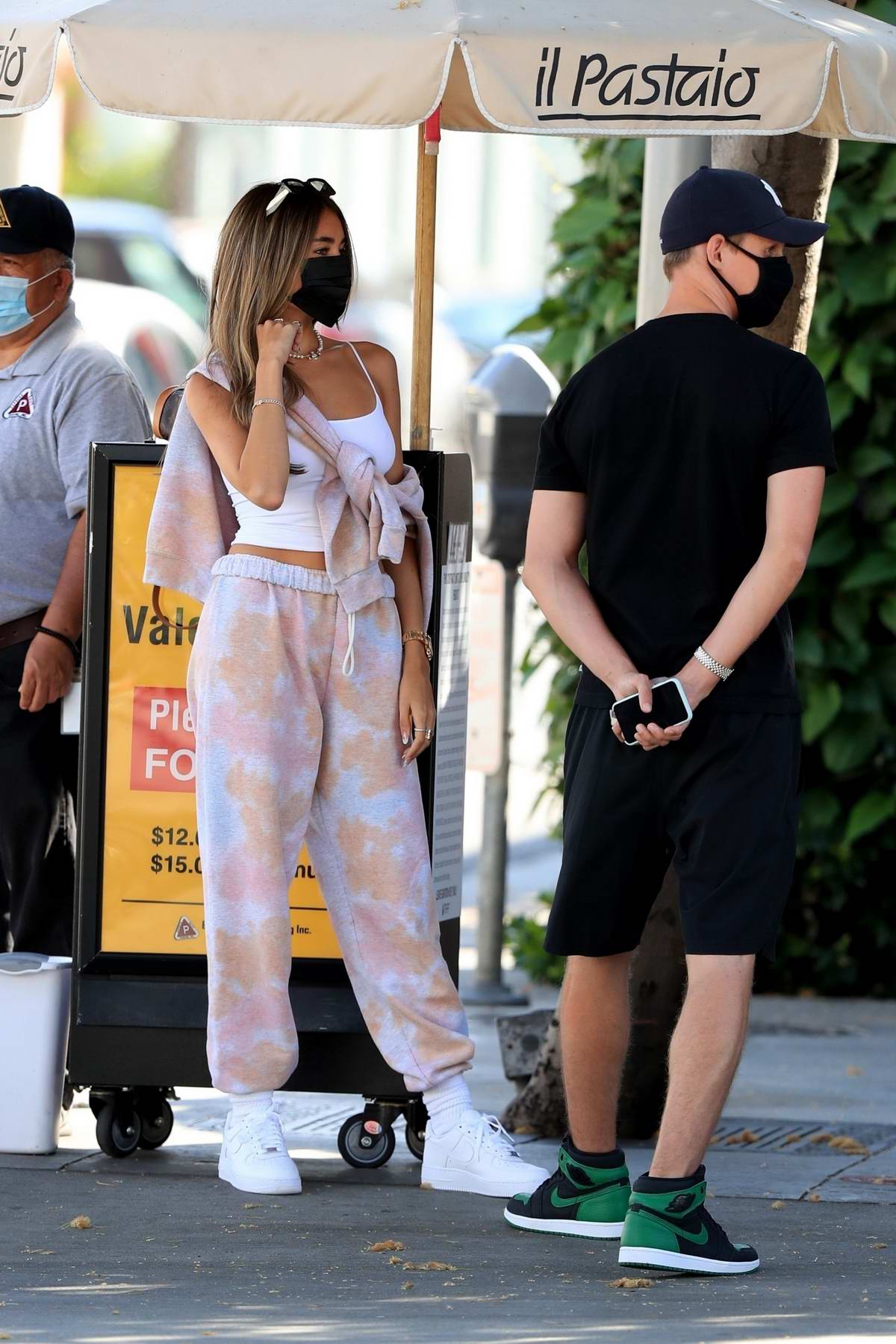 madison beer seen waiting for her ride after lunch with a mystery man at il  pastaio in beverly hills, california-220720_7