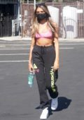 Madison Beer flashes her washboard abs in a tiny pink sports bra as she  leaves a dance studio