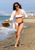 Rebecca Gormley looks fab a two-toned bikini while enjoying the beach with Biggs Chris in Marbella, Spain