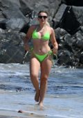 Tallia Storm dons a neon green bikini while enjoying a sunny day at Jersey beach, Jersey