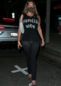 Anastasia Karanikolaou rocks all-black top and leggings for dinner at BOA Steakhouse in West Hollywood, California