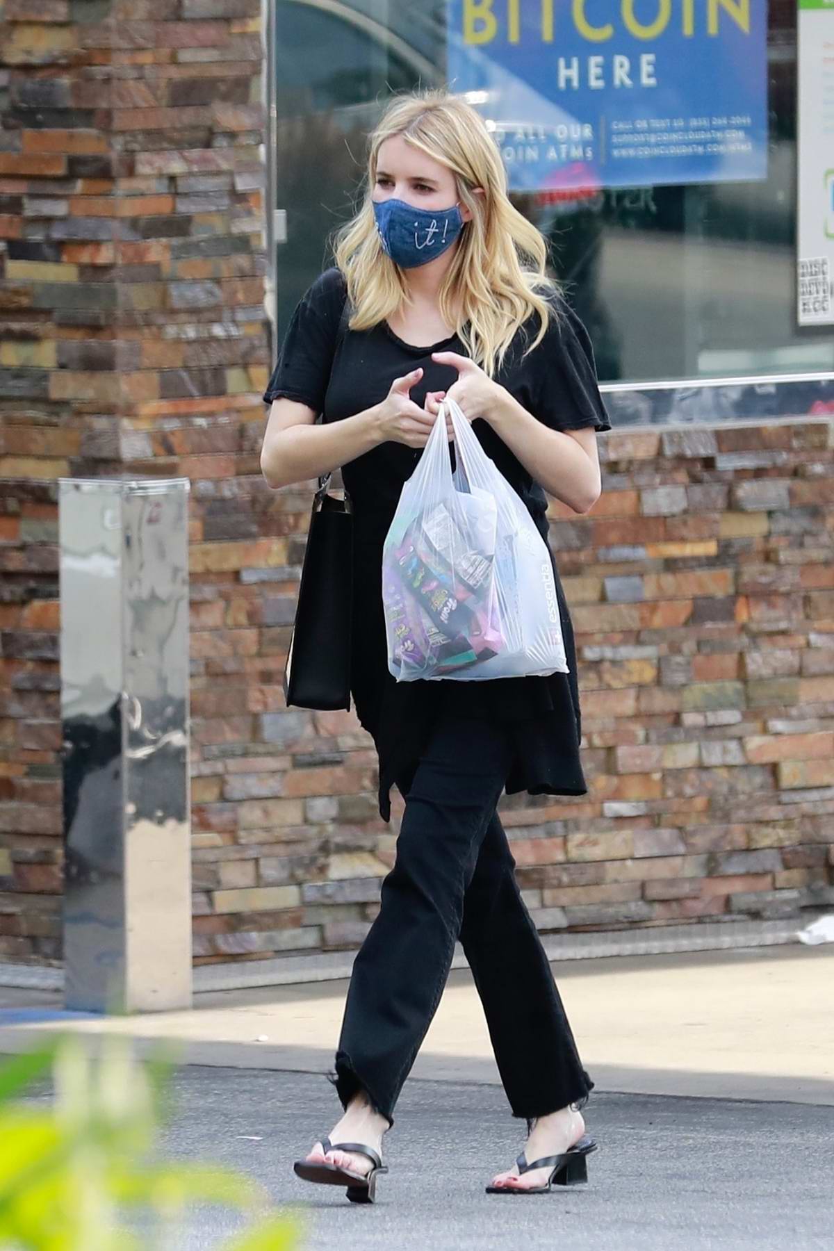 Emma Roberts spotted in all-black ensemble while picking up some sweets at  a gas station