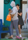 Katy Perry keeps a low profile while running errand with her puppy Nugget in Los Angeles
