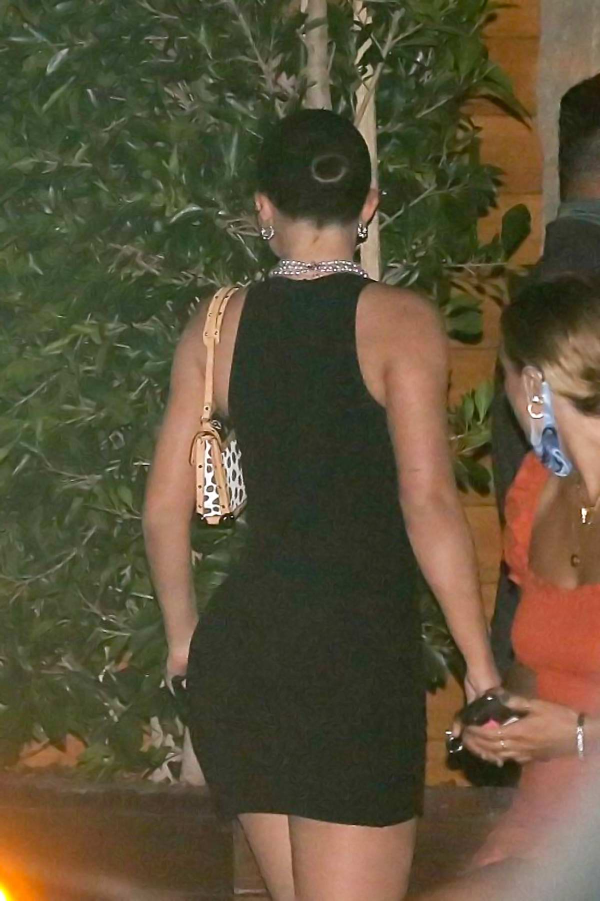 Kylie Jenner rocks a black mini dress as she arrives at SoHo House for  dinner in