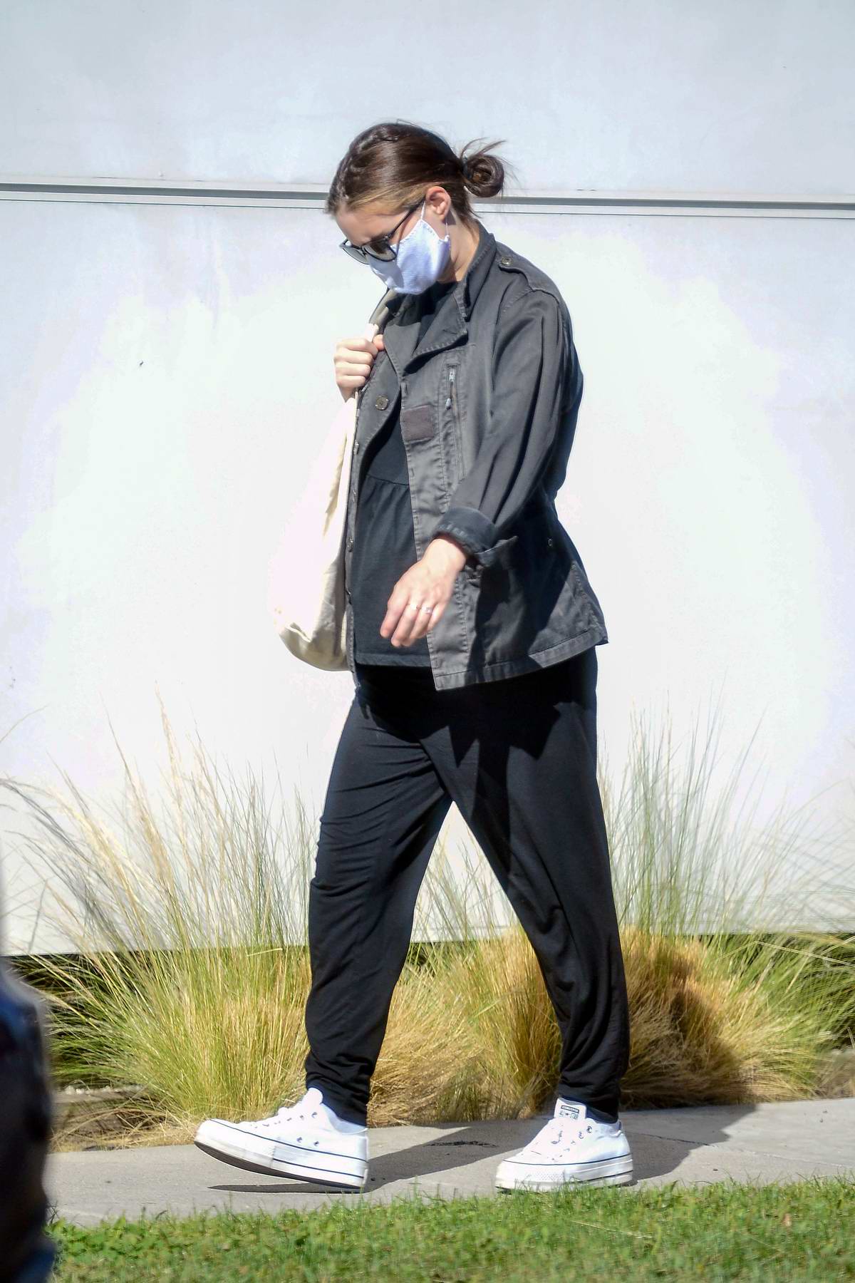 Rooney Mara shows off her growing baby bump while out for her doctor's