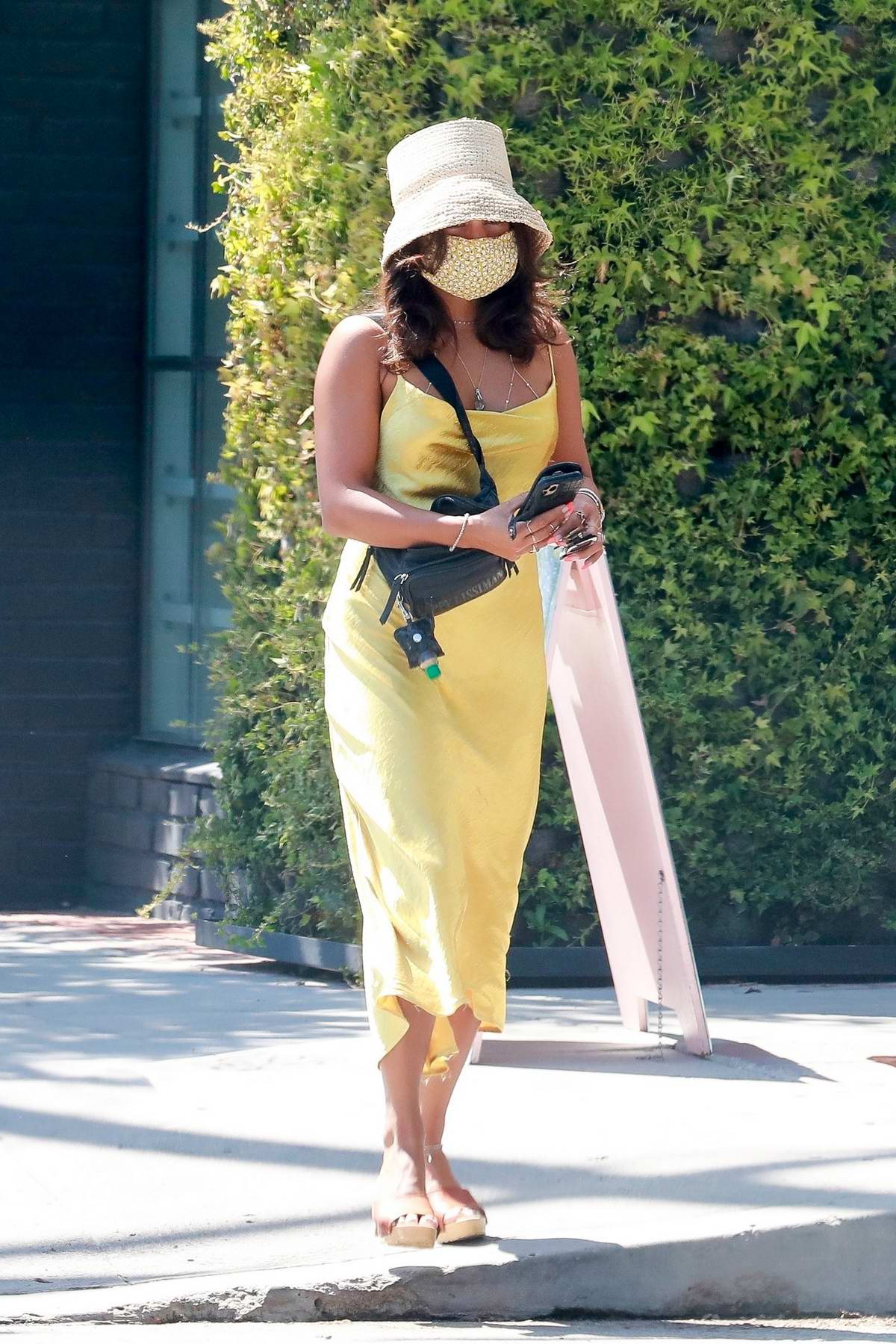 vanessa hudgens stands out in a bright yellow dress while out for some  shopping in los angeles-150820_2
