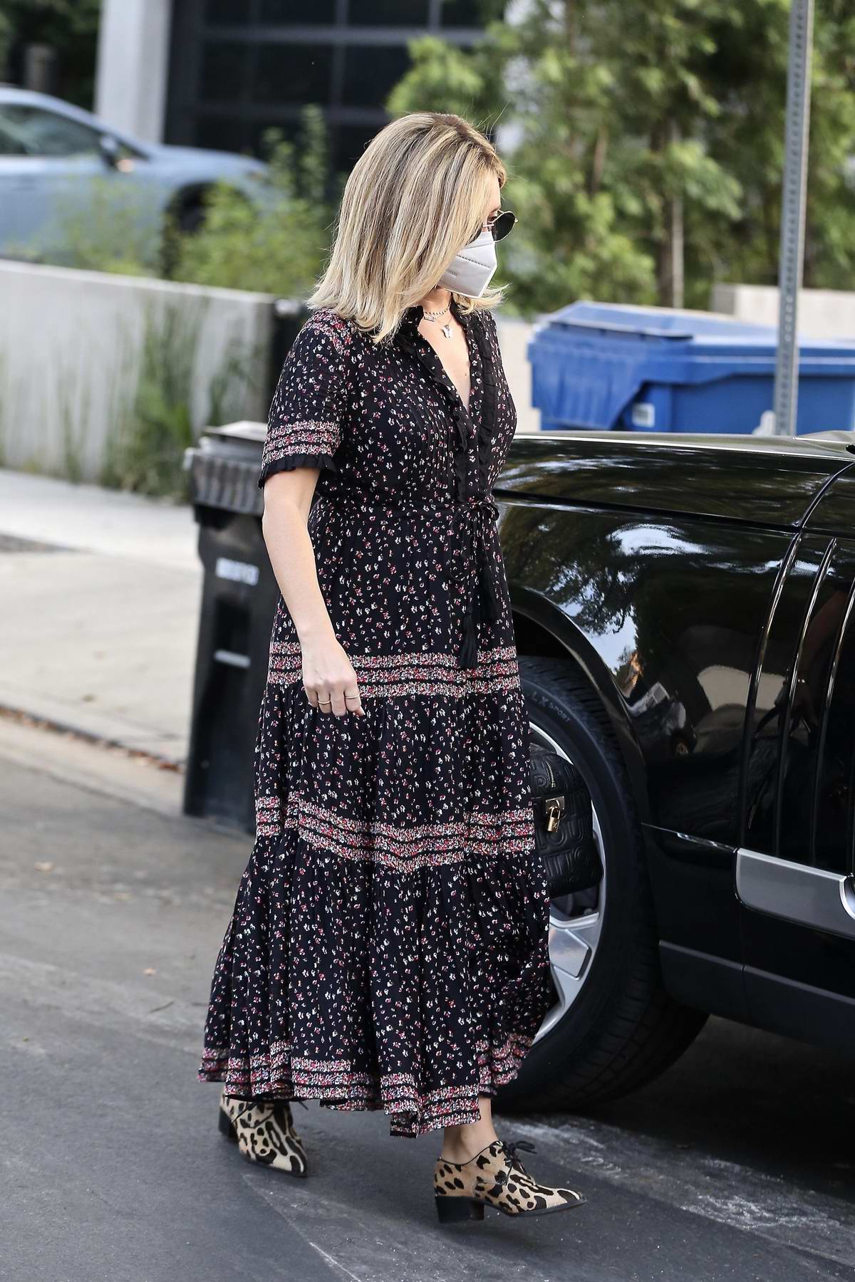 Aubrey Plaza dons a floral print mini dress while heading for an appearance  on NBC's Today