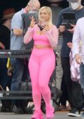 Bebe Rexha shows off her curves in bright workout gear while filming a commercial for a new JBL headgear in Los Angeles