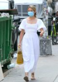 Diana Agron looks radiant in a white dress while out for a stroll in Soho, New York