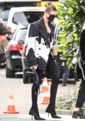 Hailey Bieber puts on a stylish display as she steps out during Milan Fashion Week in Milan, Italy