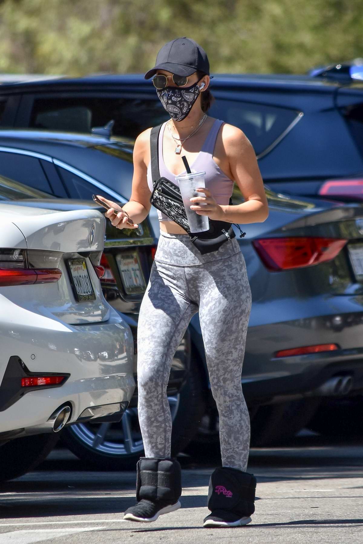 lucy hale sports cropped tank top and leggings for a solo hike session in  the hills of studio city, california-310820_5