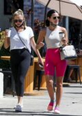 Lucy Hale stands out in hot pink legging shorts while heading for