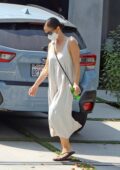 Minka Kelly seen wearing long white dress as she leaves a friends house after a short visit in Los Angeles