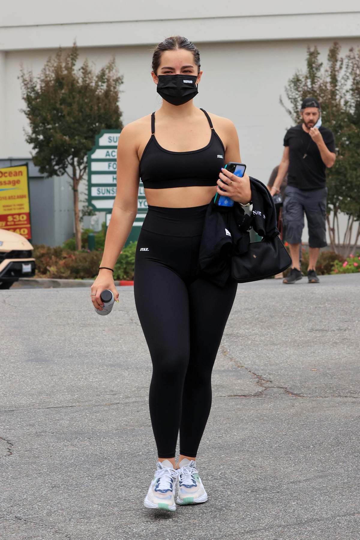 Addison Rae looks great in black sports bra and leggings as she leaves a  Hot Yoga