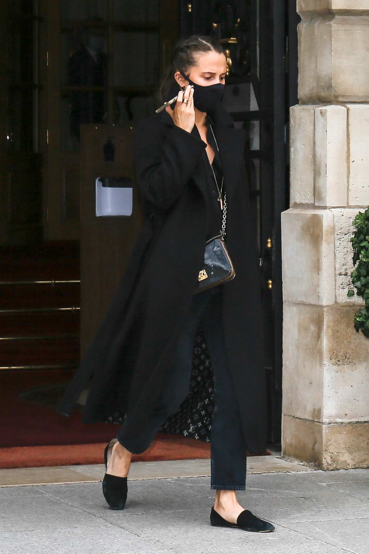 Alicia Vikander nails Parisian chic in black tailcoat at the star