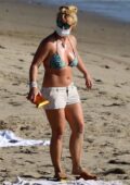 Britney Spears soaks up the sun in a bikini during beach day in Malibu, California