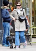 Emma Corrin looks casually chic while out for a stroll with her dog in London, UK