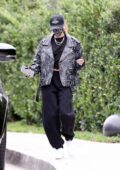 Hailey Bieber sports a trendy look while stopping by a friend's house in Beverly Hills, California