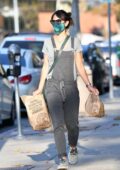 Jordana Brewster wears gray overalls while grabbing some Chipotle in Brentwood, California