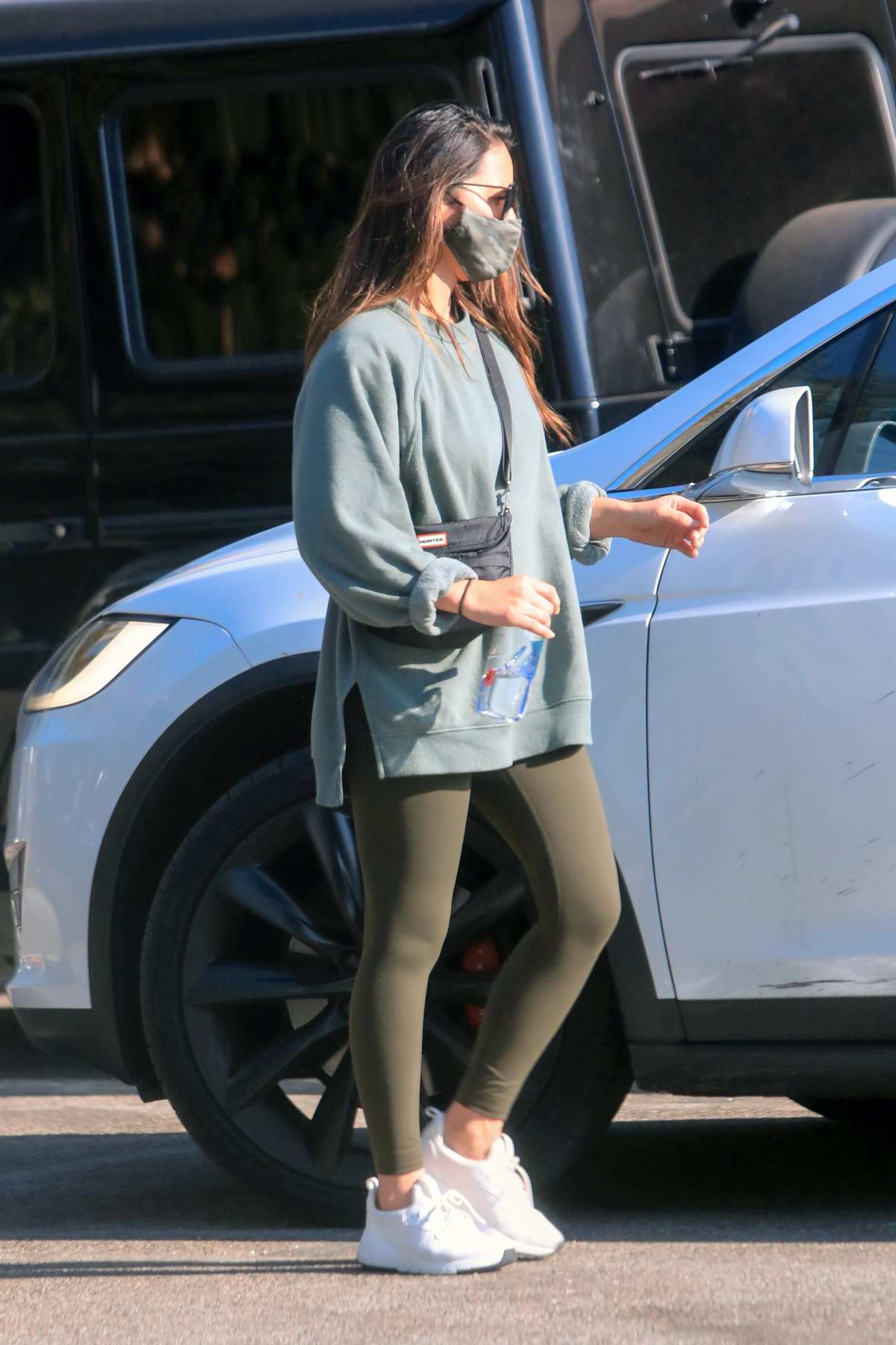 Olivia Munn spotted in a oversized sweatshirt and leggings as she leaves  the gym in Los