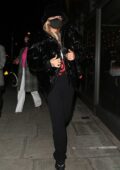 Rita Ora dons all black while out for dinner with friends at Taqueria Mexican restaurant in Notting Hill, London, UK
