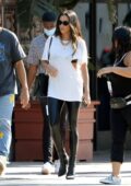 Shay Mitchell waves a Canadian flag while filming a project with boyfriend Matte Babel in Los Angeles