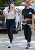 Ana de Armas sports a cream top and navy leggings while out hiking with a friend in Hollywood, California