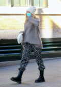 Elsa Hosk steps out looking cozy in an oversized grey sweater in New York City