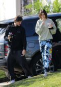 Kaia Gerber and Jacob Elordi stay cozy in sweats as they stop to visit friends in West Hollywood, California