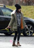 Lucy Hale bundles up in fur-lined puffer jacket while walking her dog Elvis in Upstate New York