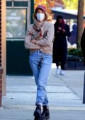 Maya Hawke looks cozy in a sweater while out for lunch with a friend in Manhattan's West Village, New York City