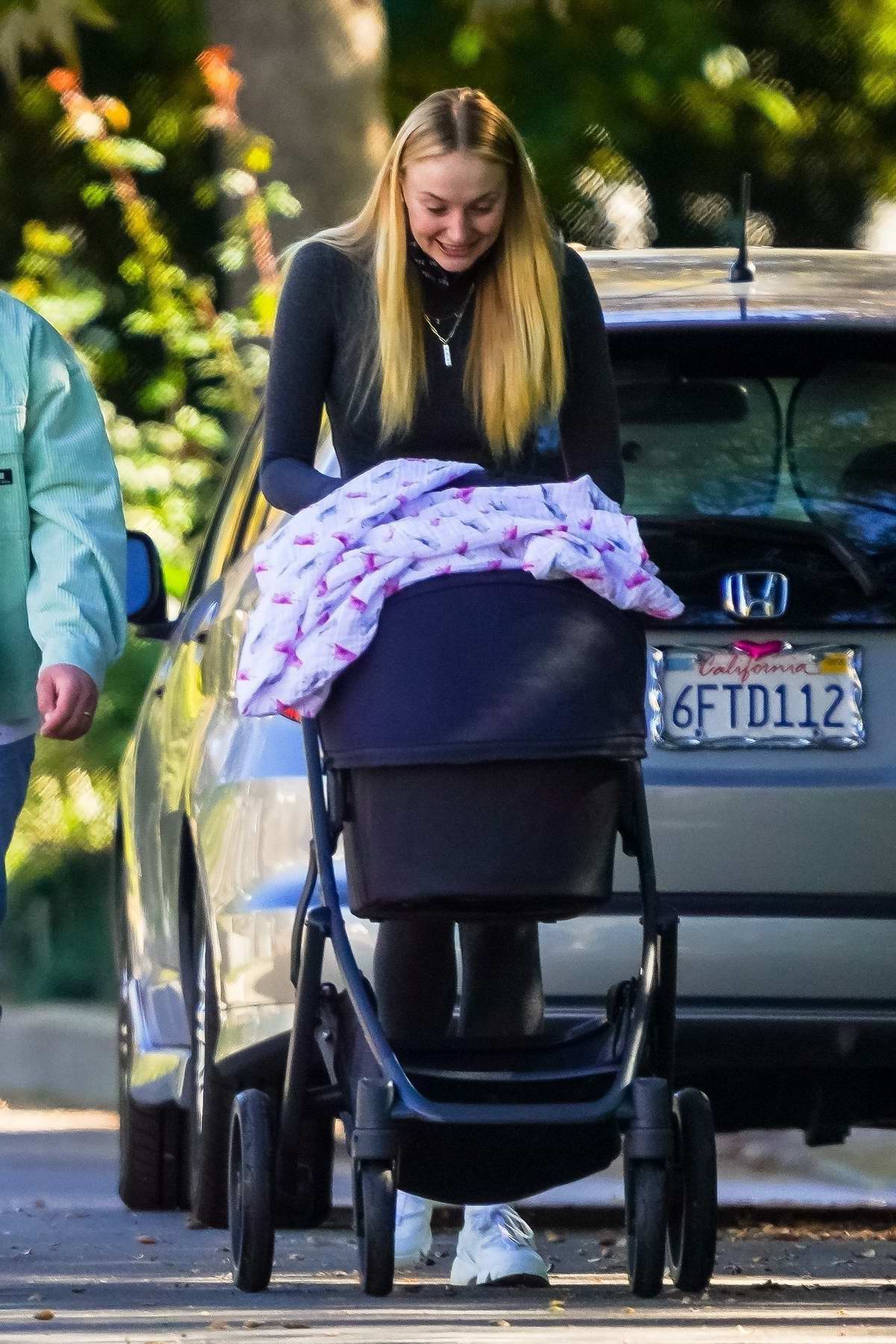 sophie turner and joe jonas take their baby daughter willa out for a sunday  stroll with her nanny in los angeles-251020_2