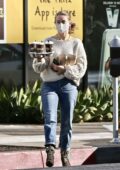 Julianne Hough keeps it casual with a sweater and jeans while making a morning coffee run in Los Angeles