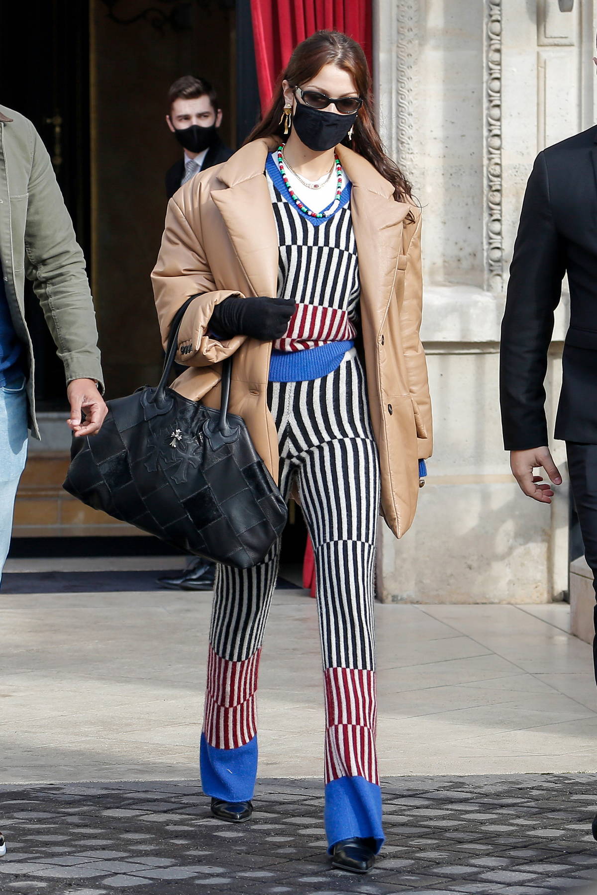 Bella Hadid looks stylish in stripes as she leaves her hotel during Paris  Fashion Week 2021