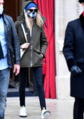 Cara Delevingne keeps it low key as she stops out of La Reserve hotel in Paris, France