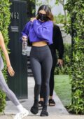 kendall jenner sports a cropped blue sweatshirt and black leggings for a  workout session in los angeles-120121_4