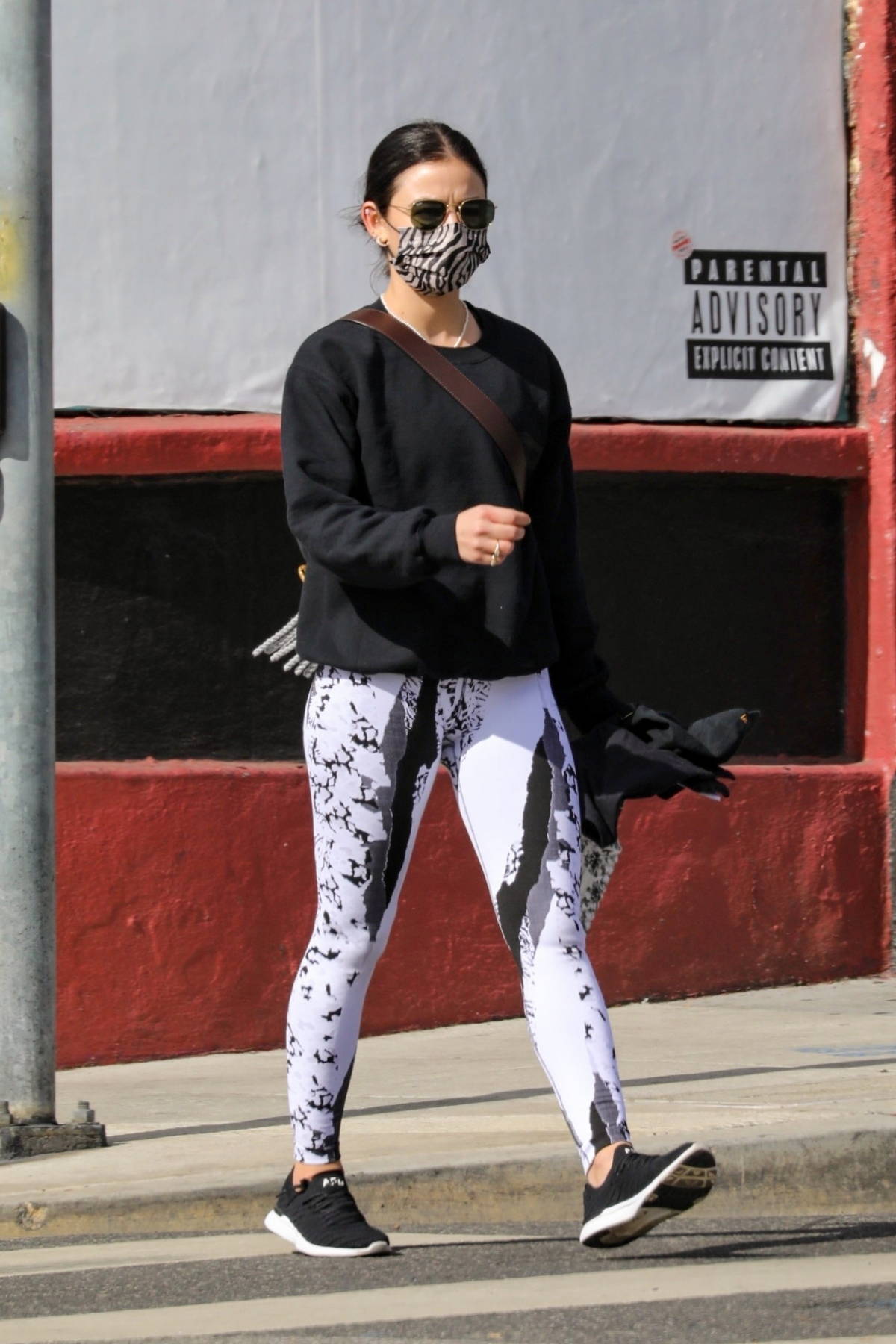 Lucy Hale sports black and white patterned leggings as hits a private gym  in Los Angeles