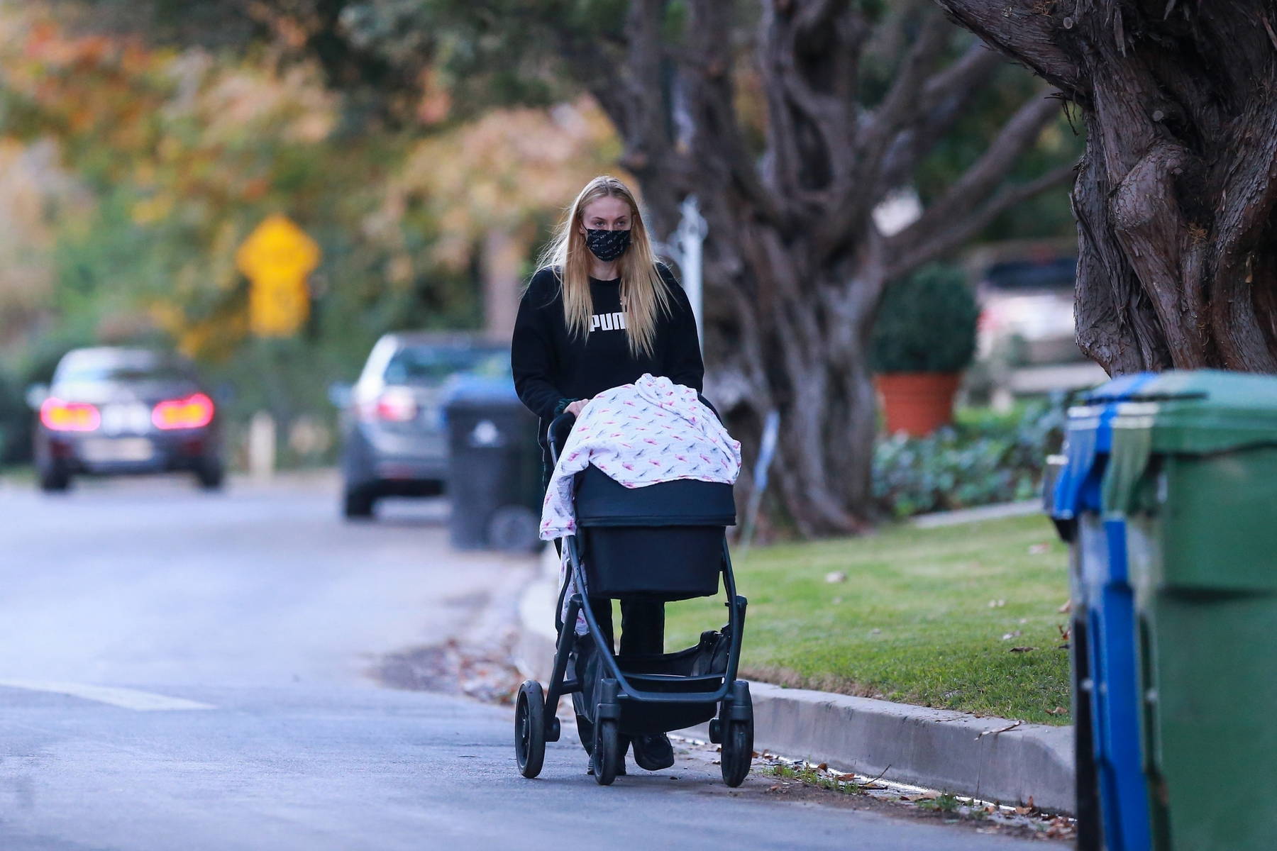 Sophie Turner takes her baby girl Willa out for an afternoon walk near her  home in