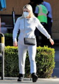 Ariel Winter looks cozy in a white sweatsuit as she stocks up on groceries at Gelson's in Los Angeles
