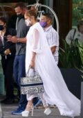Jennifer Lopez looks great in a white dress as she and Alex Rodriguez leaves Mr C Coconut Grove Hotel in Miami, Florida