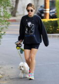 Lucy Hale collects some packages before taking her dog on another walk in Los Angeles