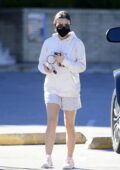 Lucy Hale keeps it comfy in a white hoodie and shorts while heading to Alfred's Coffee in Los Angeles