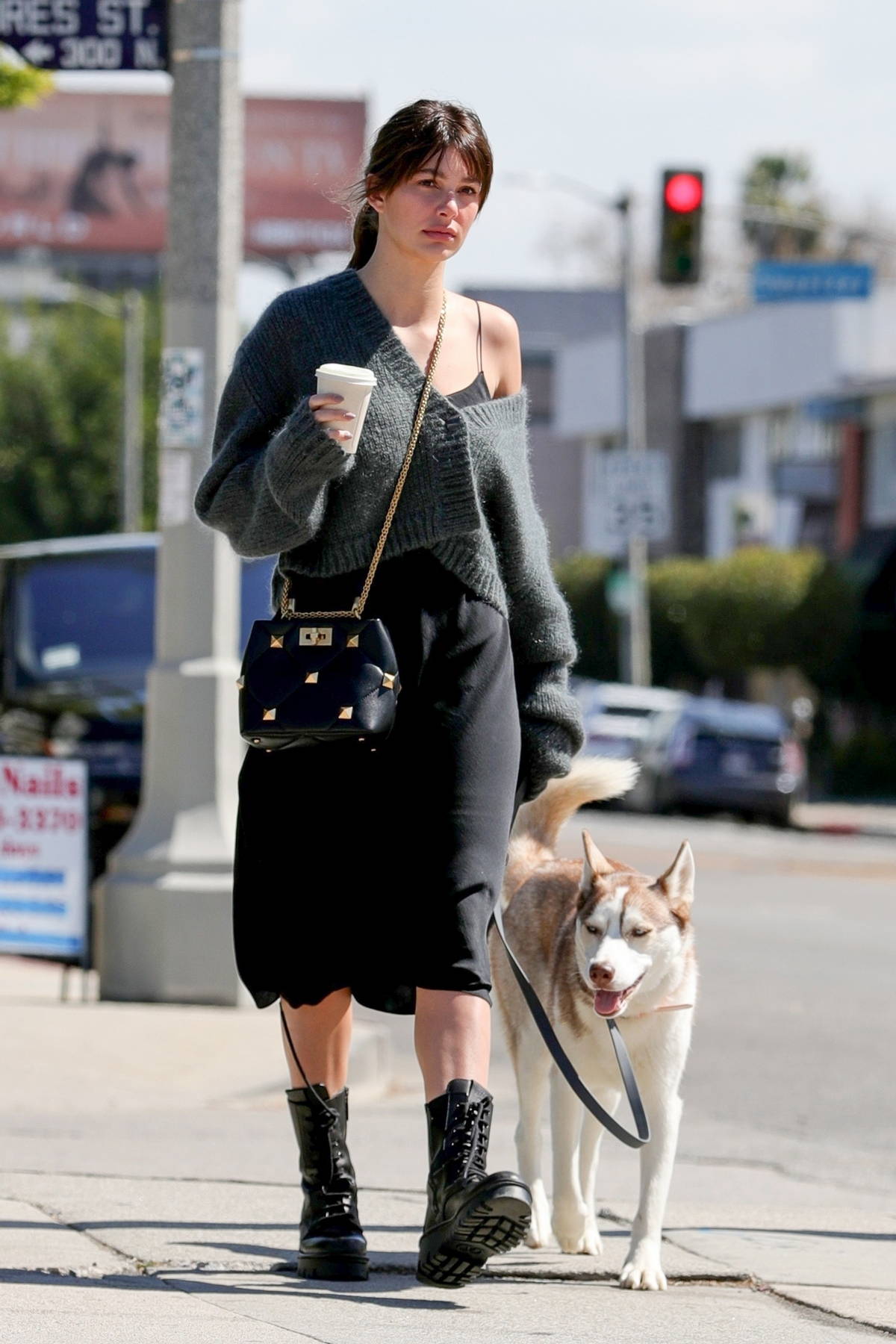 https://www.celebsfirst.com/wp-content/uploads/2021/03/camila-morrone-looks-stunning-in-a-black-dress-with-a-grey-sweater-while-out-for-coffee-with-her-dog-in-west-hollywood-california-090321_11.jpg