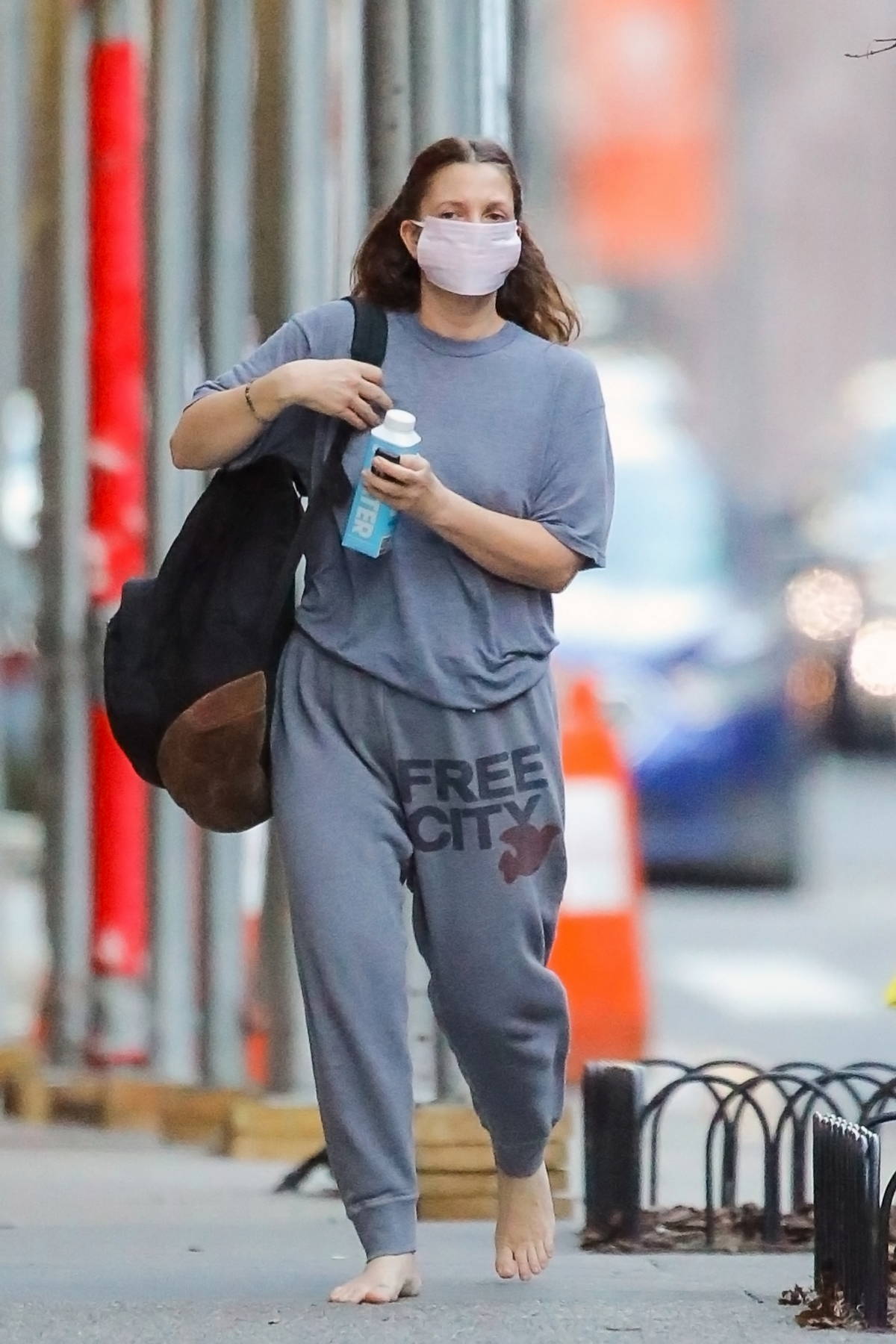 Drew Barrymore keeps things casual as she goes barefoot while out