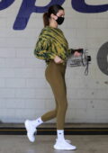 Kendall Jenner displays her model figure in green leggings while leaving a  workout in Beverly Hills