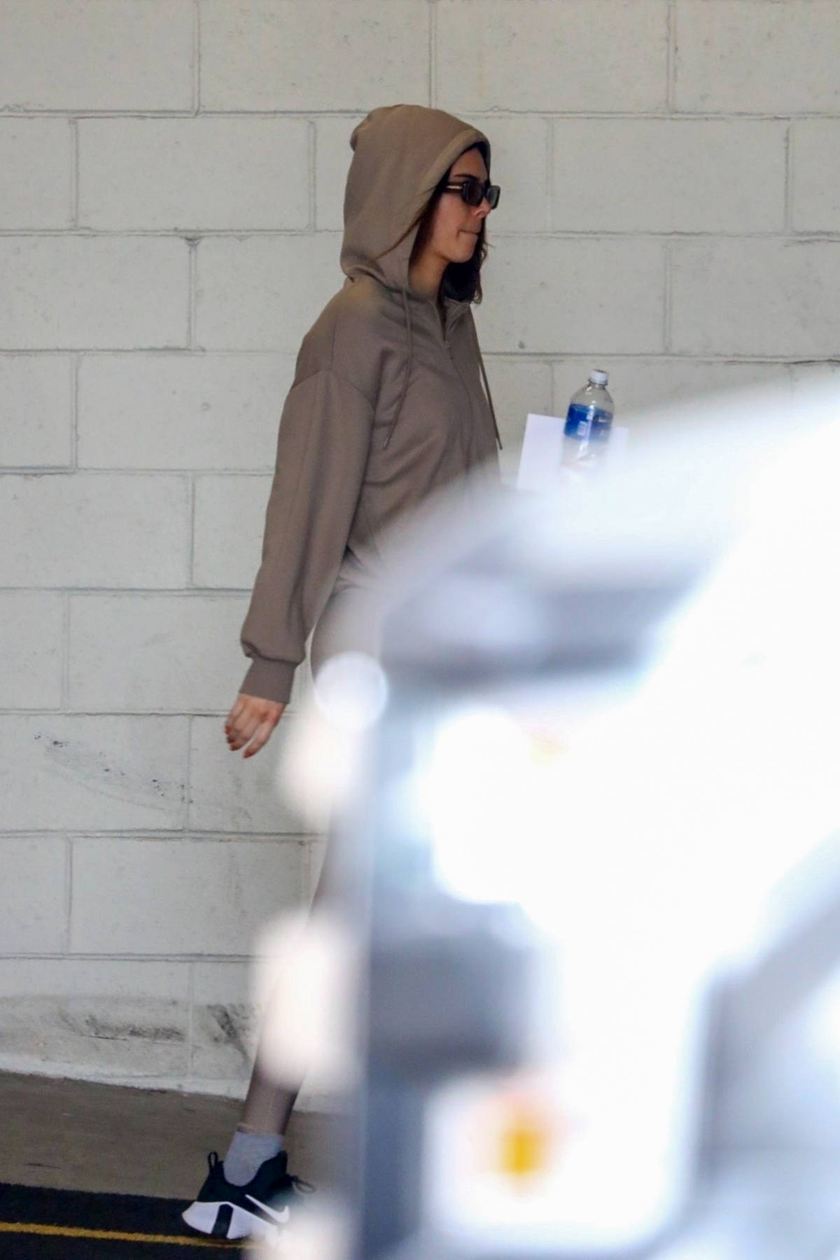 Kendall Jenner sports a hoodie with matching leggings as she