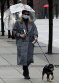 Lili Reinhart stays warm in a grey coat as steps out to walk her dog in Vancouver, Canada